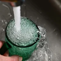 faucet water filling glass