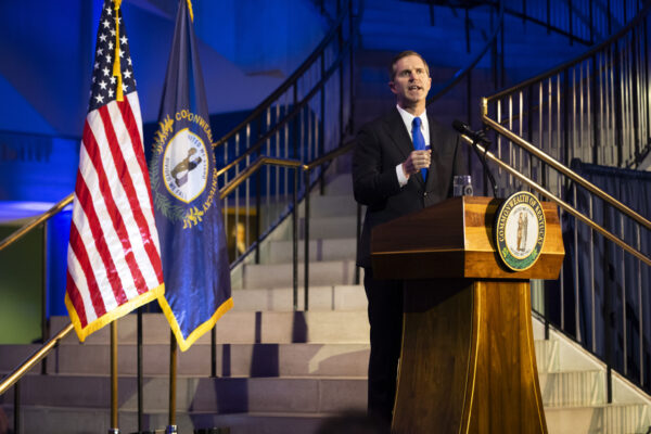 besheat at podium
