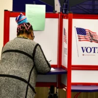 voter casting ballot