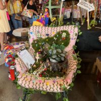 chair with fairies and moss