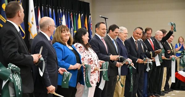 The ribbon cutting at the Blue Grass Chemical Agent-Destruction Pilot Plant (BGCAPP) in 2019 was a testament to years of cooperation between government and grassroots leaders. Community advocate Craig Williams can be seen third from the right in the ribbon line. (Photo courtesy of Craig Williams)