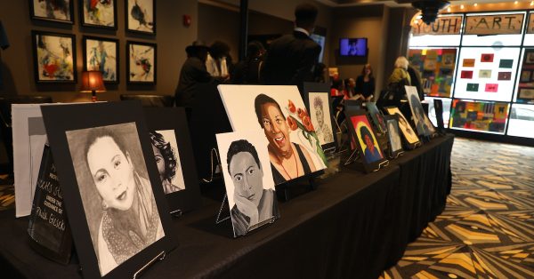 Artwork created by Christian County High School students is displayed during a celebration of the life  honoring Hopkinsville native Gloria Jean Watkins, who wrote under the pen name bell hooks, on Saturday, April 2, 2022, at the Alhambra Theatre. (Photo by Tony Kirves | Special to Hoptown Chronicle)