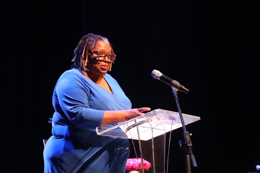 Kentucky Poet Laureate Crystal Wilkinson speaks during a celebration of Hopkinsville native Gloria Jean Watkins, who wrote under the pen name bell hooks, on Saturday, April 2, 2022, at the Alhambra Theatre in Hopkinsville. Wilkinson was just beginning her literary career when she met hooks in 1993. Earlier this year, Wilkinson received the NAACP Image Award for poetry. (Photo by Tony Kirves | Special to Hoptown Chronicle)