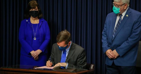 Andy Beshear signing health bills_featured