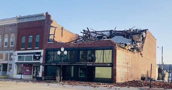 The storm destroyed the top of The Mixer on Sixth Street. The property was originally Young Hardware and dates to the late 1800s. (Hoptown Chronicle photo by Jennifer P. Brown)