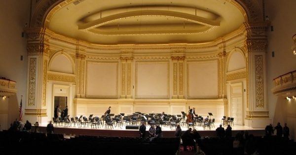 The main hall’s stage inside Carnegie Hall. (Wikimedia Commons)