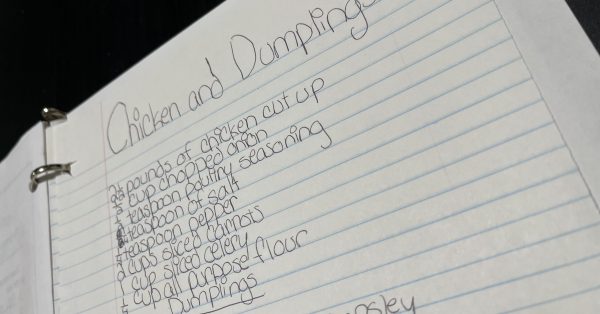 Chicken and dumplings recipe on lined paper