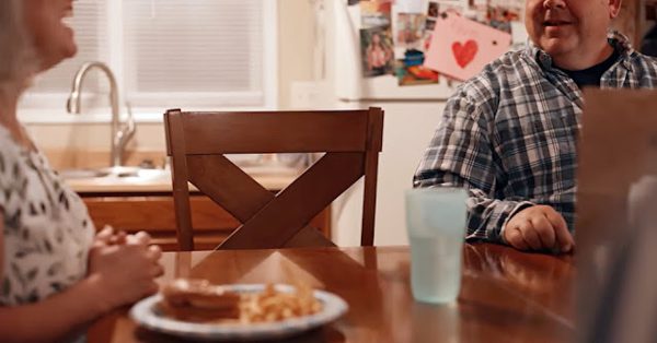 A Kelly Craft campaign ad shows tables with an empty chair. After this scene, she says, “As a mother, this is personal to me, because I have experienced that empty chair at my table. This has to stop.”