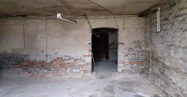 The basement of the Dalton house on East Seventh Street. This room might have been were laundry was washed by hand. (Photo by Grace Abernethy)