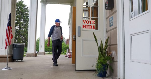 voter walking into polling place on election day
