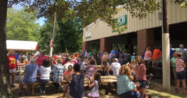 A crowd outside the speakers' pavilion at a Fancy Farm Picnic in Graves County. (WKMS photo)