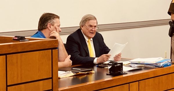 Attorney Ben Fletcher (right) sits with his client, Ward 7 city council candidate Mark Graham, during a hearing June 7, 2022, in Christian Circuit Court. (Photo by Jennifer P. Brown)