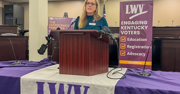 Kentucky League of Women Voters President Jennifer Jackson at podium