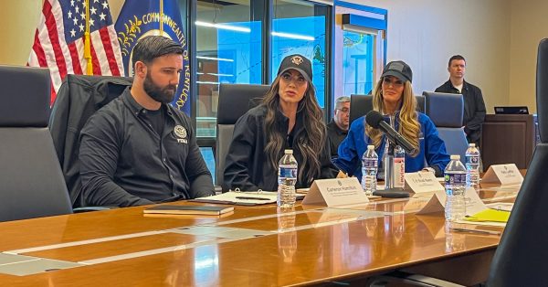 From left to right, acting FEMA Director Cameron Hamilton, Homeland Security Secretary Kristi Noem and SBA Administrator Kelly Loeffler speak to reporters after hearing an update on Kentucky floods. (Photo by McKenna Horsley | Kentucky Lantern)