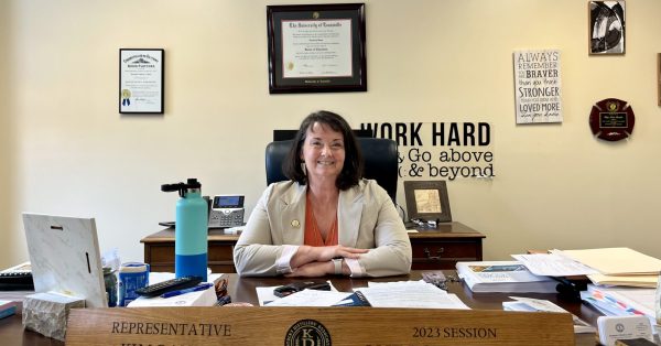 Rep. Kim Banta at desk