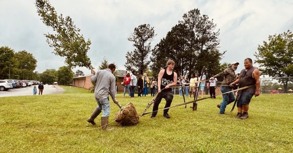 A crew working for Superlawn & Garden Center pulls a Ginkgo biloba tree on Tuesday, May 14, 2024, to the lawn of Indian Hills Elementary School. (Hoptown Chronicle photo by Jennifer P. Brown)