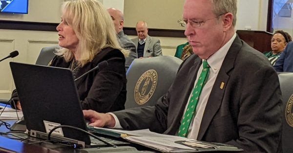 Kentucky Hospital Association President Nancy Galvagni and KHA Vice President of Policy and Government Affairs Jim Musser gave an overview of the success of the Kentucky Hospital Rate Improvement Program at the Jan. 9 House Health Services Committee. (Photo by Melissa Patrick | Kentucky Health News)