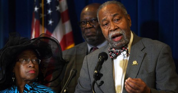 Reps. Beverly Chester-Burton, D-Louisville, and George Brown, D-Lexington, listen as Senate Democratic Floor Leader Gerald Neal of Louisville urges Kentucky’s legislature to enact gun safety laws. (Legislative Research Commission photo)