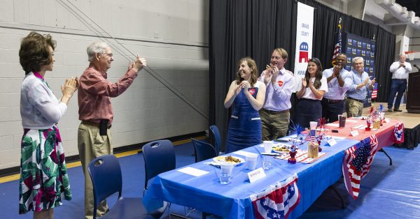 Senate Republican Leader Mitch McConnell and his wife former U.S. Transportation Secretary Elaine Chao enter the Graves County Republican Breakfast Saturday morning. (Kentucky Lantern photo by Austin Anthony)