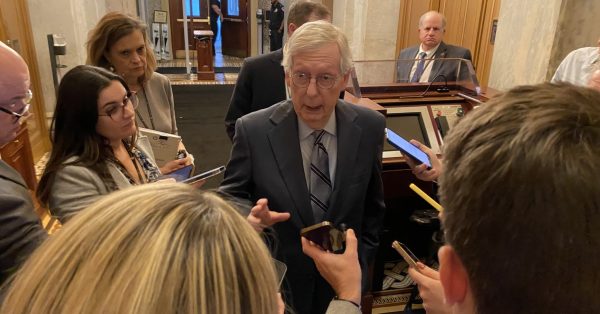 Mitch McConnell talking to reporters