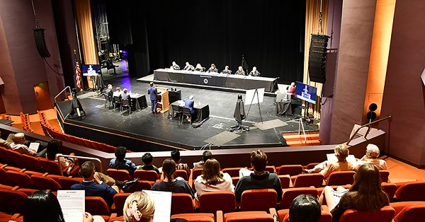 Audience members watch from above as the Kentucky Supreme Court hears oral arguments at Centre College’s Norton Center for the Arts in Danville in September. The justices convened at the college as part of its effort to make proceedings accessible to the public. (Administrative Office of the Courts photo)