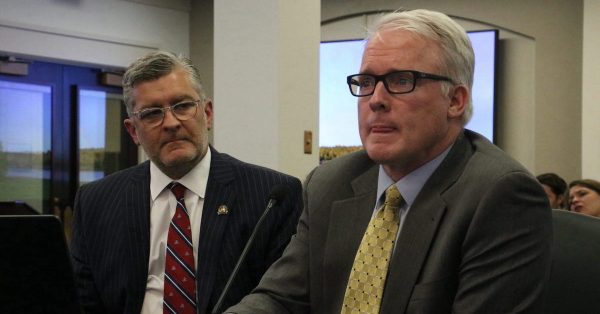 Sen. Robby Mills, R-Henderson, left, and Kent Blake with LG&E and KU at last week’s Senate committee hearing. (Kentucky Lantern photo by Liam Niemeyer)