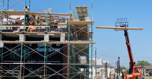 Workers begin constructing walls at The Mixer restaurant on Tuesday, April 25, 2023. (Hoptown Chronicle photo by Jennifer P. Brown)