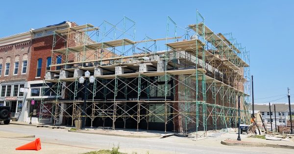 Scaffolding surrounds The Mixer restaurant on Tuesday, April 25, 2023, as construction begins to repair damages from the March 31, 2023, storm. (Hoptown Chronicle photo by Jennifer P. Brown)