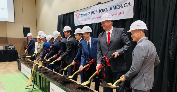 Local and state economic development officials and company representatives join Gov. Andy Beshear (center) for Toyota Boshoku's ceremonial ground-breaking Wednesday, Oct. 4, at the James E. Bruce Convention Center. (Hoptown Chronicle photo by Jennifer P. Brown)