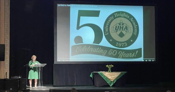 Anne Lawson Noel, science teacher and 1981 graduate of University Heights Academy, gives a history of the school during a 50th anniversary celebration Saturday, April 15, 2023, at the Alhambra Theatre (Facebook photo)