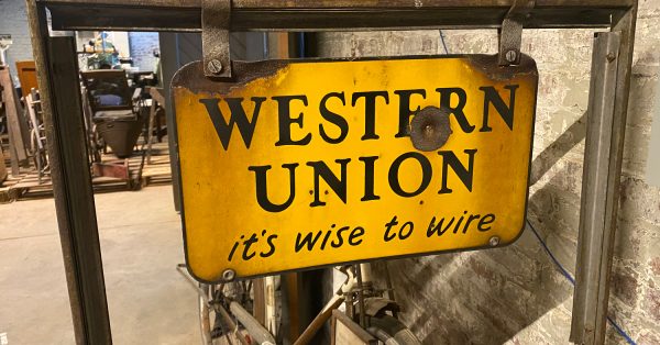 western union sign on bike rack