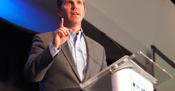 Kentucky Gov. Andy Beshear speaks to a crowd at the Iowa Democratic Party’s Liberty and Justice Celebration event in July. In an interview Aug. 14, Beshear said he hopes the attention he received as a potential vice presidential candidate benefits Kentucky. (Photo by Jack O’Connor/ Iowa Capital Dispatch)