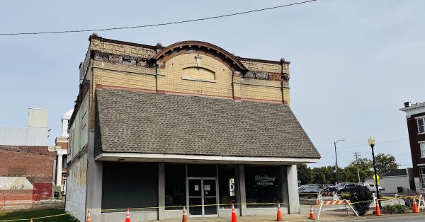 The Blue Streak Printers building on East Ninth Street, cordoned off with caution tape following an inspection that said the structure was in "imminent danger of collapse." (Hoptown Chronicle photo by Jennifer P. Brown)