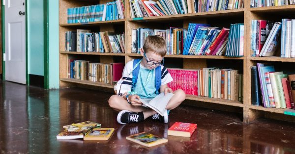 book sitting on floor reading