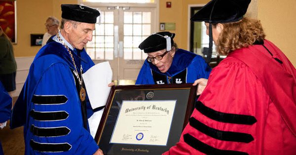 Doris Y. Wilkinson receives an honorary degree on Aug. 30, 2019. UK President Eli Capilouto is at left. (UK photo by Mark Cornelison)