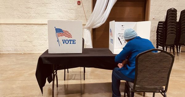 A voter marks his ballot at the James E. Bruce Convention Center on Nov. 3, 2022. (Hoptown Chronicle photo by Jennifer P. Brown)
