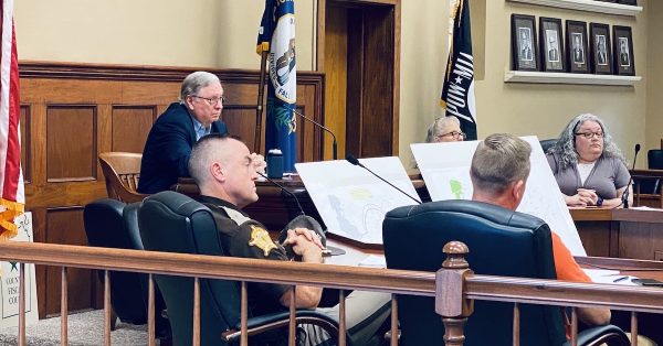 Christian County Clerk Mike Kem (top left) listens to a speaker during a county Board of Elections meeting on Friday, Aug. 12, 2022, at the county courthouse. (Photo by Jennifer P. Brown)