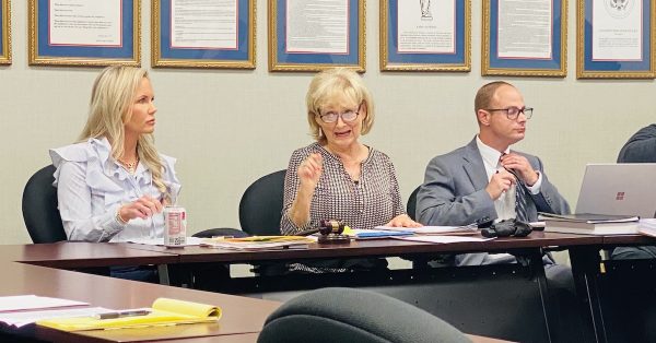 Susan Fernandez, who chairs the Hopkinsville Board of Ethics, is flanked by City Clerk Brittany Byrum and ethics board attorney Michael Cotthoff during a board meeting Wednesday at the Hopkinsville Municipal Center. (Hoptown Chronicle photo by Jennifer P. Brown)
