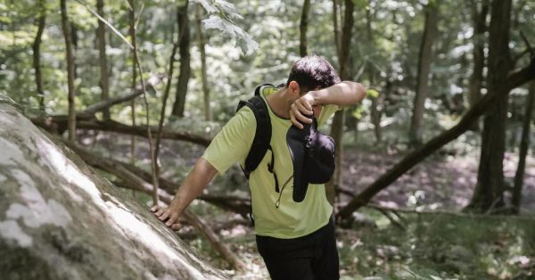 hot sweating hiker in heat