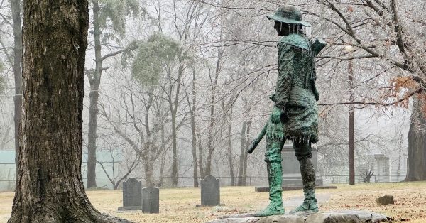 Icicles hang from Pioneer, a 1984 copper statue by Steve Shields, on Sunday, Jan. 5, 2025, in Pioneer Cemetery. (Hoptown Chronicle photo by Jennifer P. Brown)