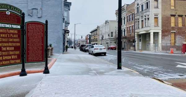 Ice coats the sidewalk on South Main street between Sixth and Seventh streets Tuesday afternoon. (Hoptown Chronicle photo by Jennifer P. Brown)