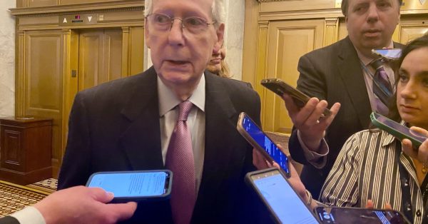 Mitch McConnel in front of recorders