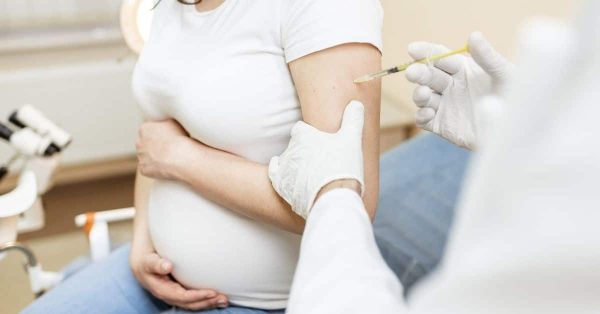 pregnant woman getting vaccine