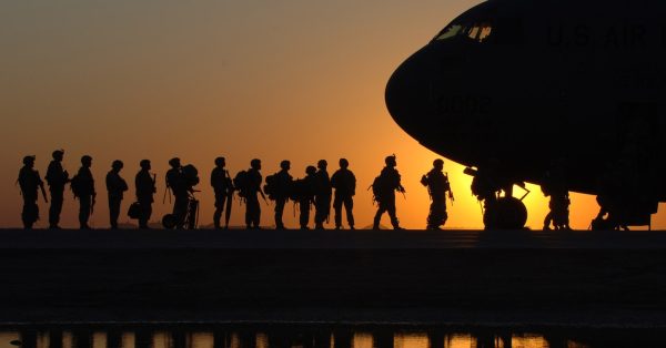 veterans walking to plane