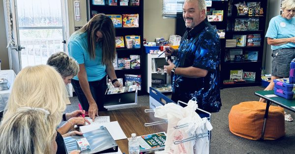 Adam Barnes, who teaches culinary arts, was the first local teacher to pick up free supplies in the new Teacher Corner when it opened Tuesday, Aug. 27, 2024. (Hoptown Chronicle photo by Jennifer P. Brown)