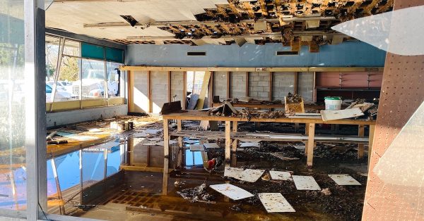 The old Price Drug Store building was flooded when windows were blown out in the storms that battered western Kentucky on Dec. 10, 2021. (Photo by Jennifer P. Brown, Hoptown Chronicle)