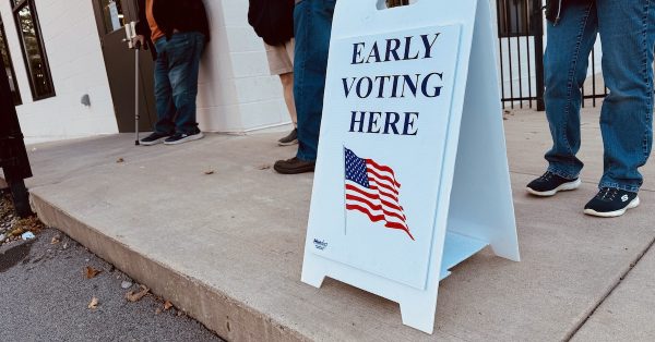 Voters wait on Nov. 2, 2024, for the voting center to open at the Boys and Girls Club on Walnut Street. (Hoptown Chronicle photo by Jennifer P. Brown)